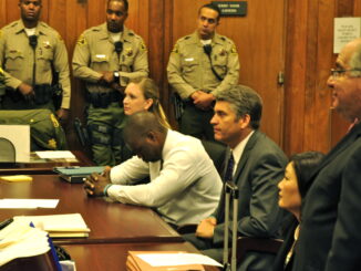 The moment Brian Banks is finally exonerated. From left: Alissa Bjerkhoel, Brian Banks, Justin Brooks. Photo credit: Heidi Brooks.